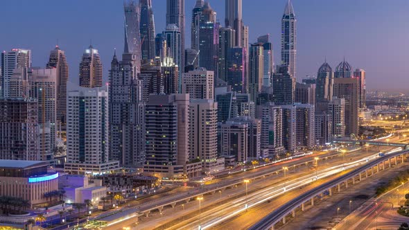 Dubai Marina Skyscrapers Aerial Top View Before Sunrise From JLT in Dubai Night to Day Timelapse UAE alt