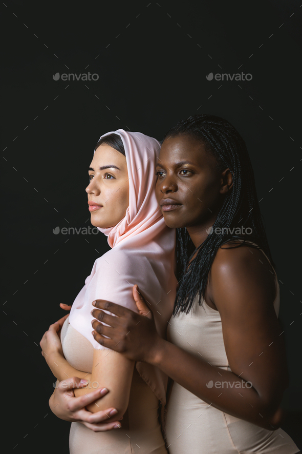 Beautiful women posing in underwear Stock Photo by oneinchpunchphotos