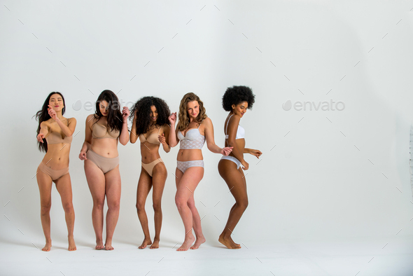 Beautiful women posing in underwear Stock Photo by oneinchpunchphotos