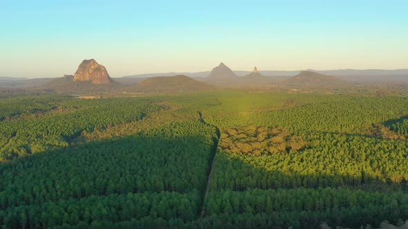 Aerial view of Wild Horse Mountain Lookout & the Glass House Mountains, Queensland, Australia. alt