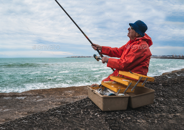 Old Man Fishing In The Sea Stock Photo By Megostudio Photodune