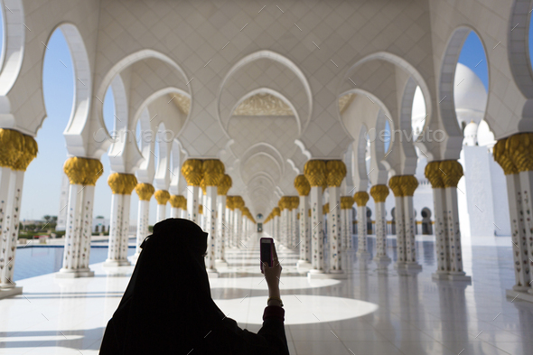 Woman and selfie at Sheikh Zayed Mosque in Abu Dhabi - Stock Photo - Images