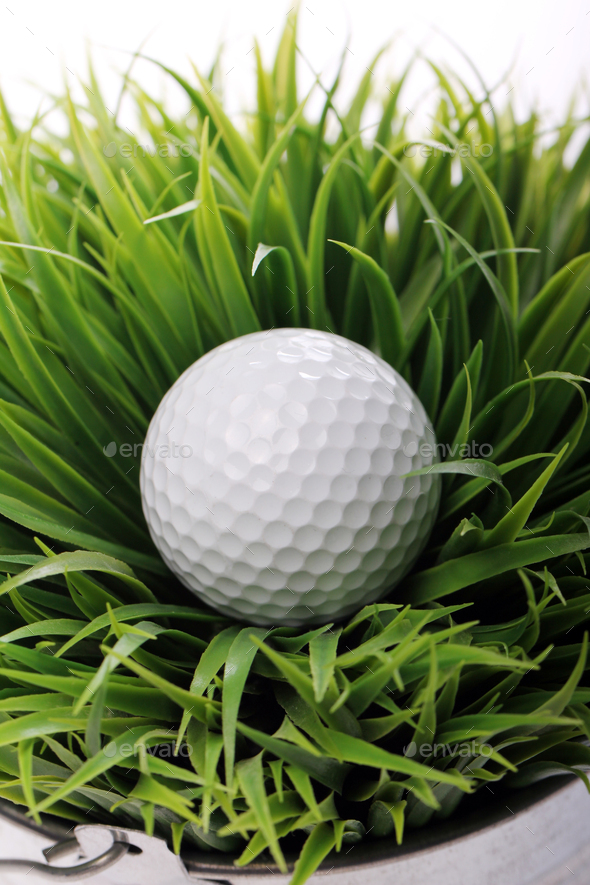 Golf ball in grass - Stock Photo - Images