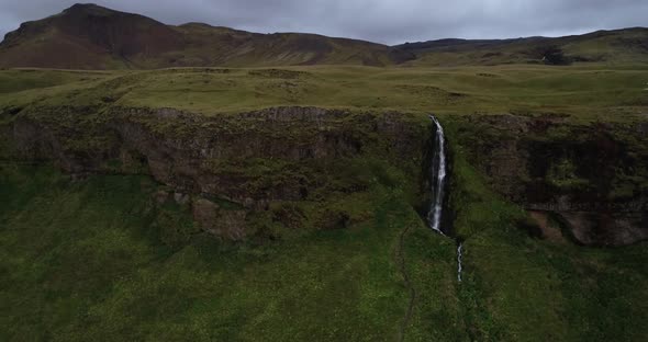 Aerial Waterfall Cliff Mountain In Iceland alt