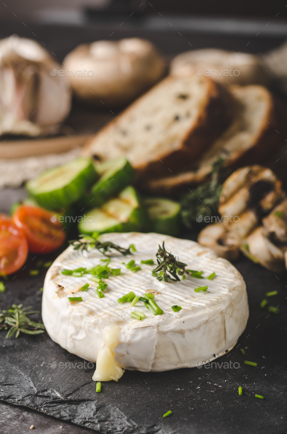 Camembert cheese grilled, fresh roasted vegetable Stock Photo by PeteerS