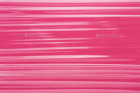 Cling Film Folds Texture, Pink Plastic Vinyl Background.