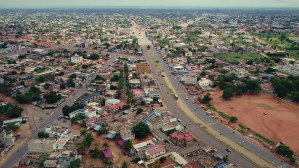 CInematic Circular Motion Aerial View of African City Road with Traffic, Lomé West Africa alt