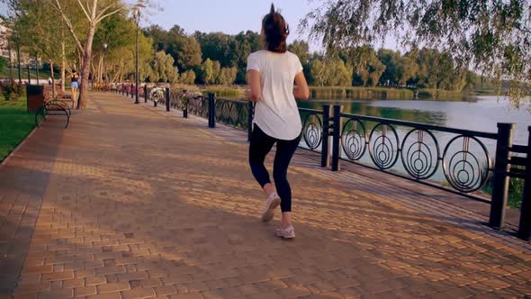 Girl Runs on the Waterfront alt