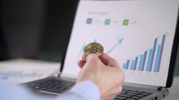 Bitcoin in the hands of a businessman. Symbol of cryptocurrency alt