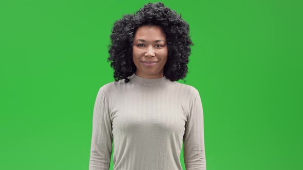 Green Screen Young African Female Shows Ring Gesture