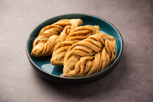 Mathri or Mathiya is a popular North-west Indian snack Stock Photo by ...