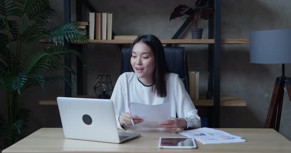 Confident Asian Female Web Coach Online Teacher or Customer Support Service Operator Speaking to alt