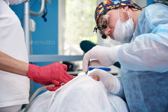 surgery-in-a-dental-clinic-stock-photo-by-viktoriian-photodune