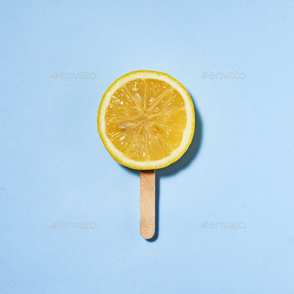 Summer concept lemon on a stick instead of ice cream - Stock Photo - Images