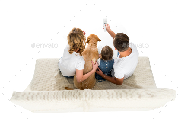 overhead view of family with dog watching tv on sofa, isolated on white