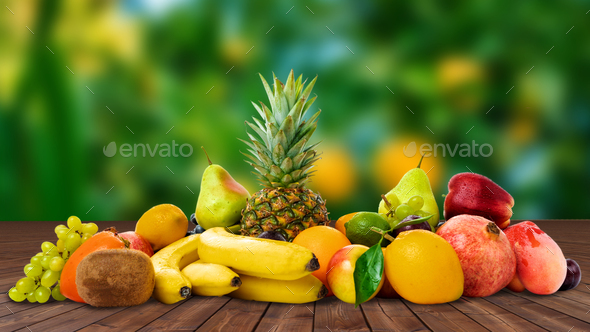 Composition Of Fruits. delicious ripe fruits on table Stock Photo by  EwaStudio