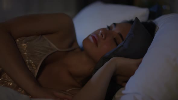 Young Pretty Woman Waking Up Bed in the Night alt