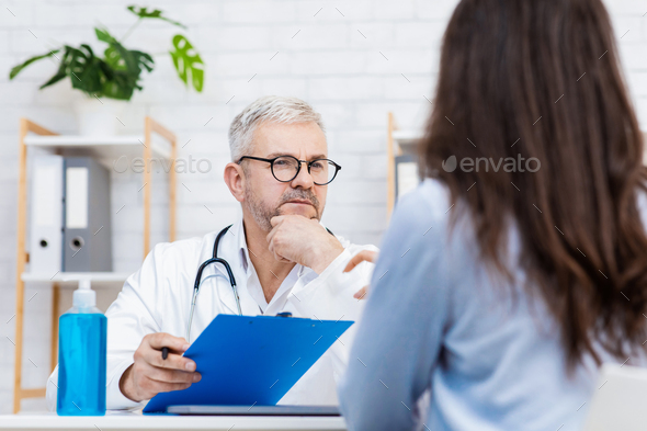 Consult patient in private hospital, diagnostics and medical exam - Stock Photo - Images