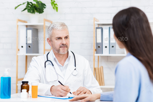 Regular checkup examine in modern clinic, family doctor and pharmaceutical - Stock Photo - Images