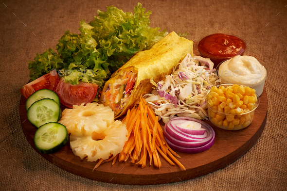 Vegetarian shawarma on a wooden board - Stock Photo - Images