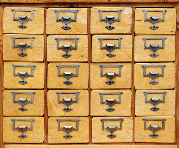 Wooden cabinet with drawers Stock Photo by sergeyskleznev