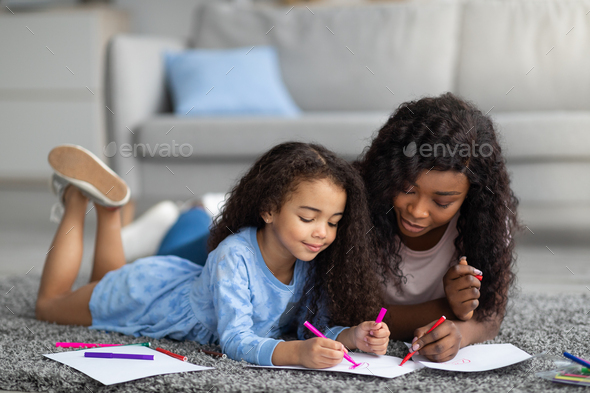 Bonding, Drawing And Mother And Child At A Restaurant With Art, Creativity  And Color On Paper. Creative, Happy And Girl Learning To Draw With Her Mom  While Eating At A Cafe And
