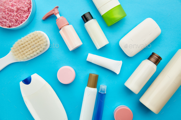 Oral and skin care products, blue background - Stock Photo - Images