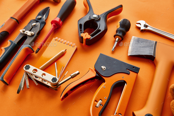 Professional workshop instrument, red background - Stock Photo - Images