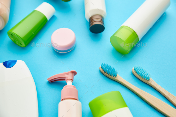 Oral and skin care products, blue background - Stock Photo - Images