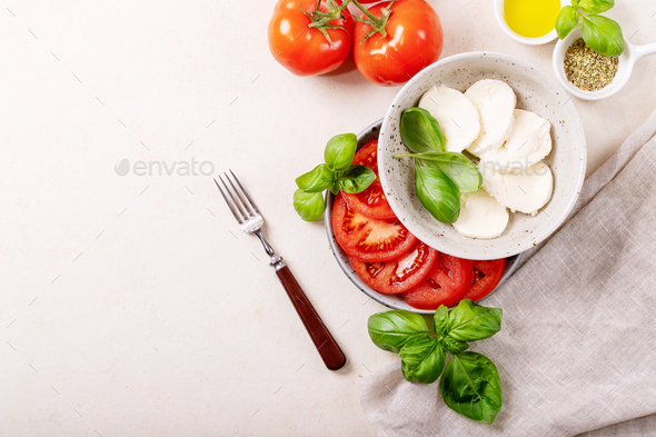 Mozzarella salad over white texture background - Stock Photo - Images