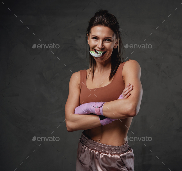 Female fighter torso poses in white kimono and sportive strong arms are  closeup black belt. Japanese karate and sports concept. Indoor, studio  shot, i Stock Photo - Alamy