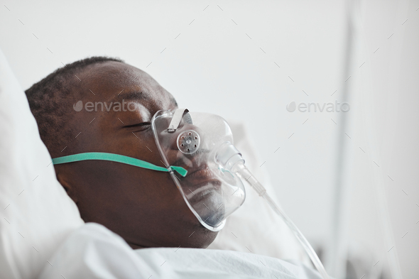 Young Man with Oxygen Support in Hospital