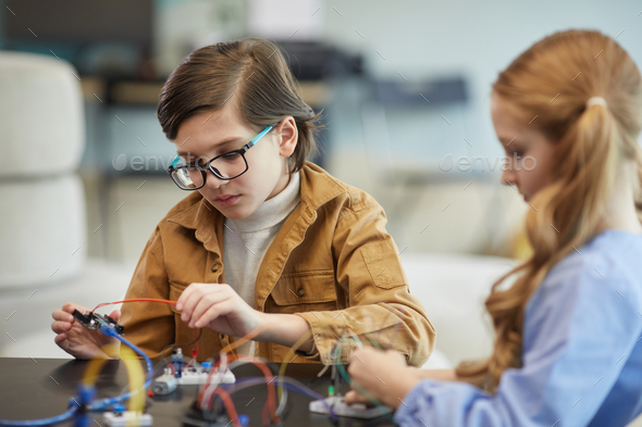 Children in Engineering Workshop Stock Photo by seventyfourimages ...