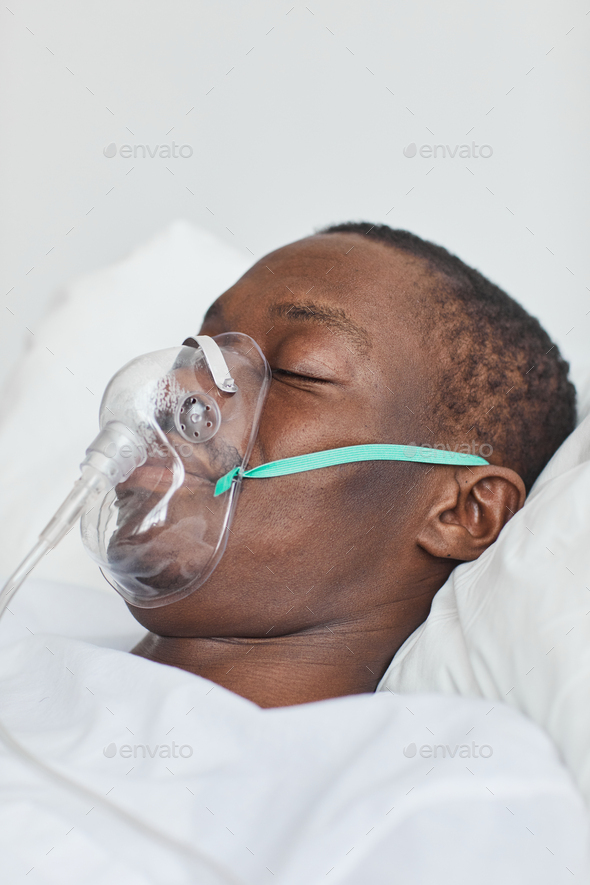 African American Man with Oxygen Support in Hospital
