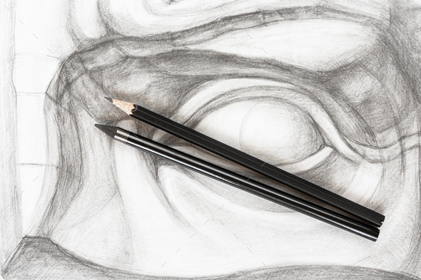 top view of different graphite pencils on drawing