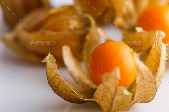 Juicy Winter Cherry On A White Acrylic Background Stock Photo By Wolfhound9111