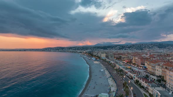 Panorama Over Nice City and Mediterranean Sea Aerial Day to Night Timelapse alt