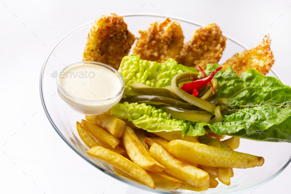 Chicken tenderloin with French fries and lettuce