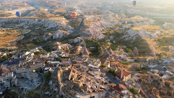 Aerial view of Cappadocia. Colorful hot air balloons flying over the valleys alt