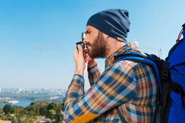 Capturing Memories. Handsome Young Man Carrying Backpack And Taking ...