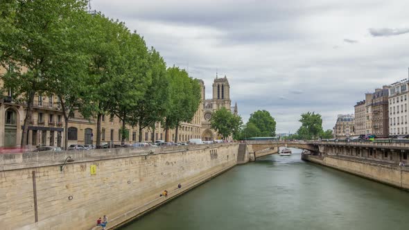 Notre Dame De Paris and Seine Timelapse Hyperlapse is the One of the Most Famous Symbols of Paris alt
