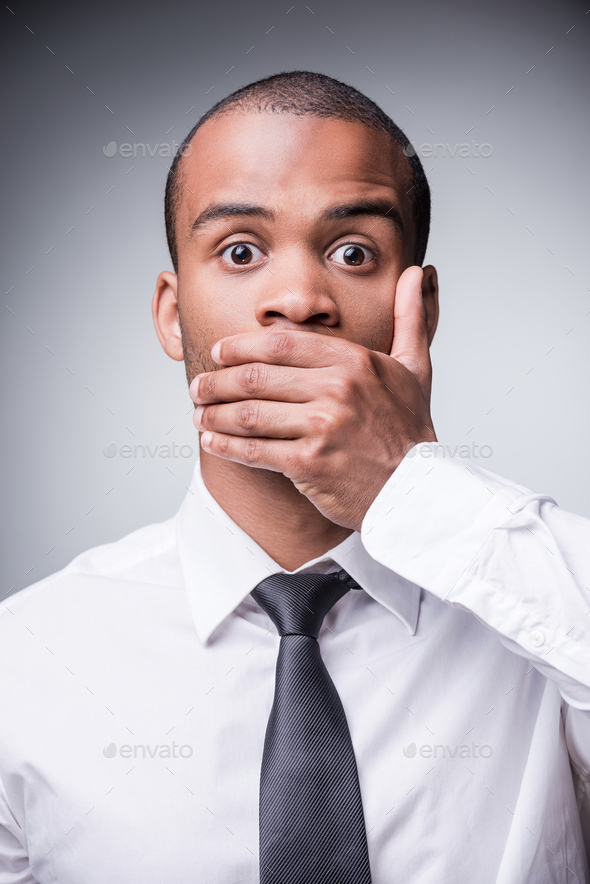 Saying no evil.  - Stock Photo - Images