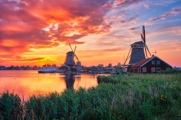 Windmills at Zaanse Schans in Holland on sunset. Zaandam, Nether - Stock Photo - Images