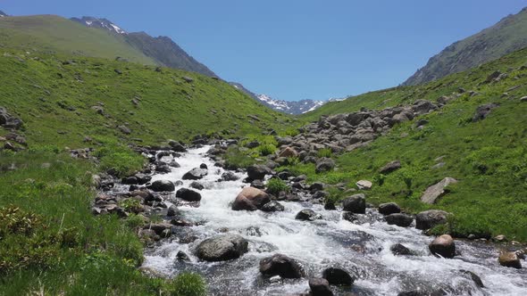 Creek flowing through the valley