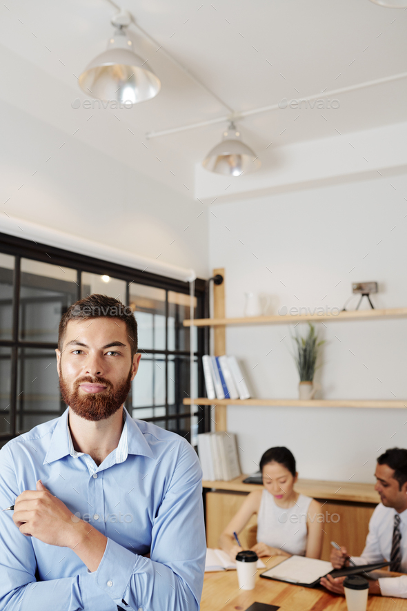 Handsome smiling entrepreneur - Stock Photo - Images