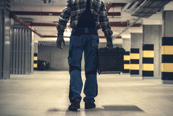 Technician Worker with Large Tools Box in Hands - Stock Photo - Images