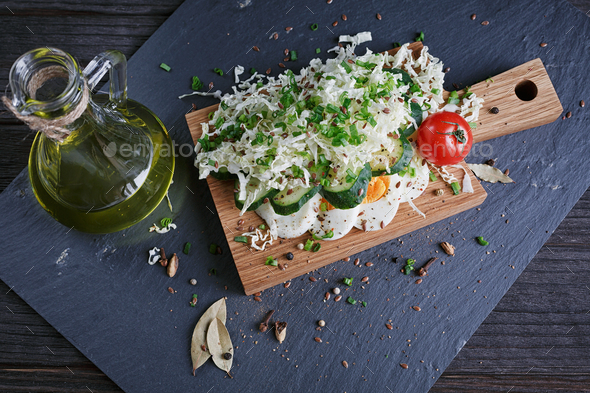 Healthy food ingredients with tomato, cucumber, cabbage, green onion, egg and spices - Stock Photo - Images