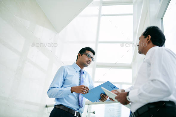 Talking coworkers - Stock Photo - Images