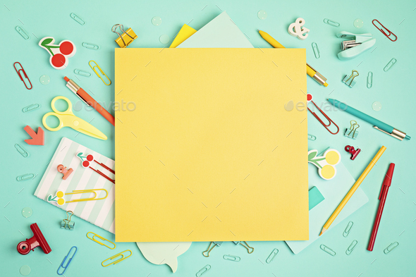 Back to school concept. School and office supplies on pastel background ...