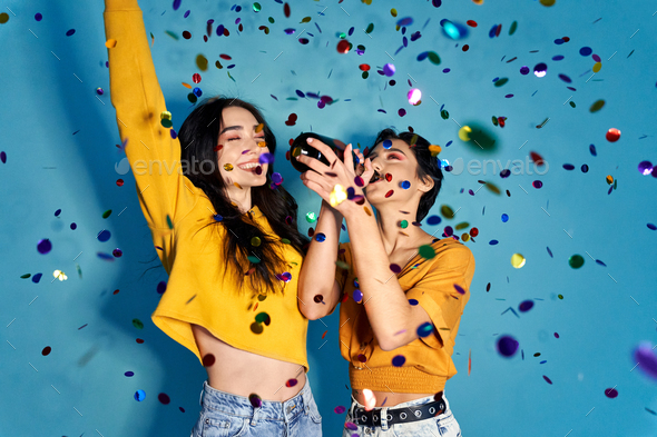 Gen Z Girls Celebrating Party Dancing In Confetti And Drinking